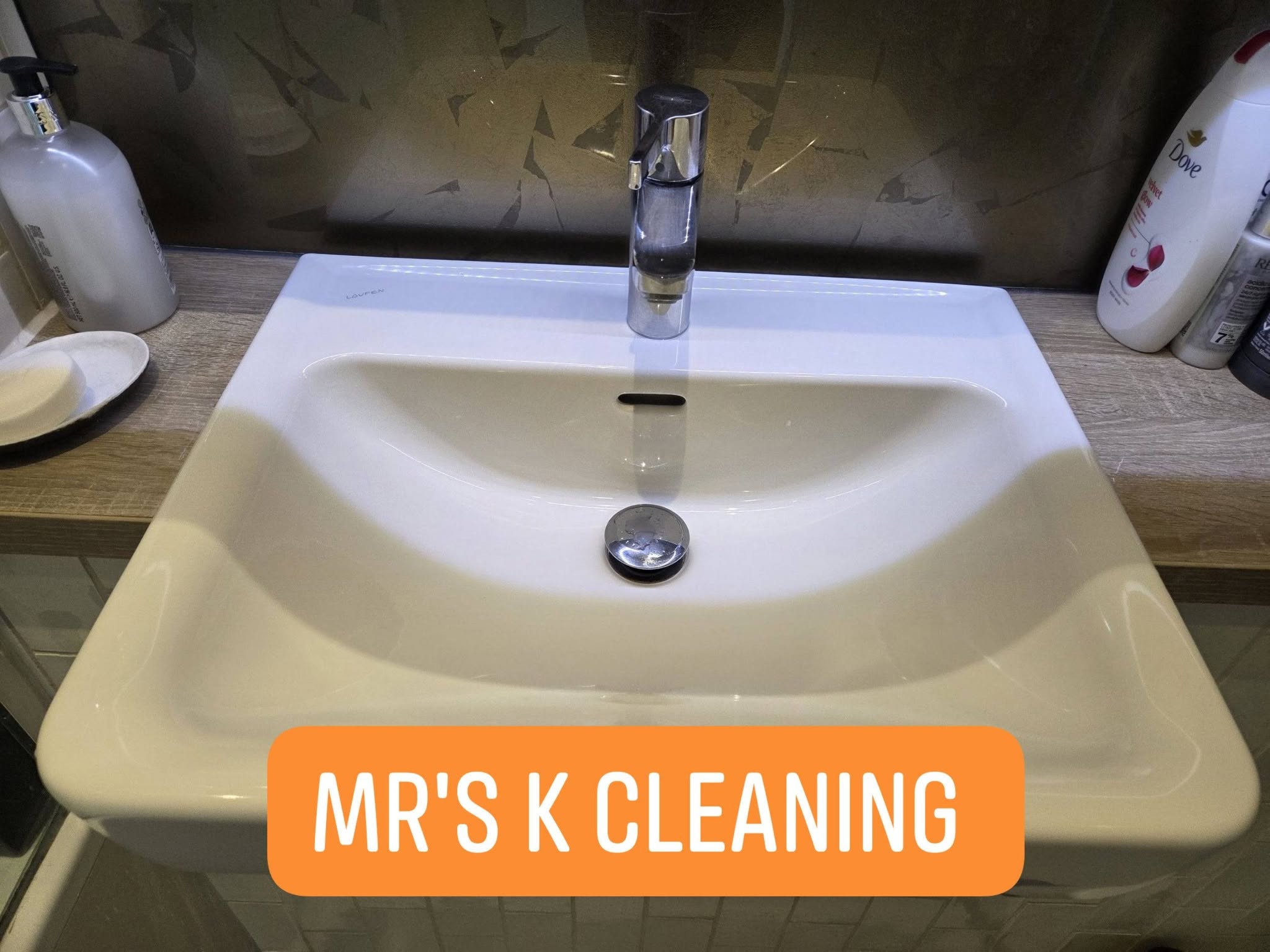 Sparkling bathroom sink with chrome faucet