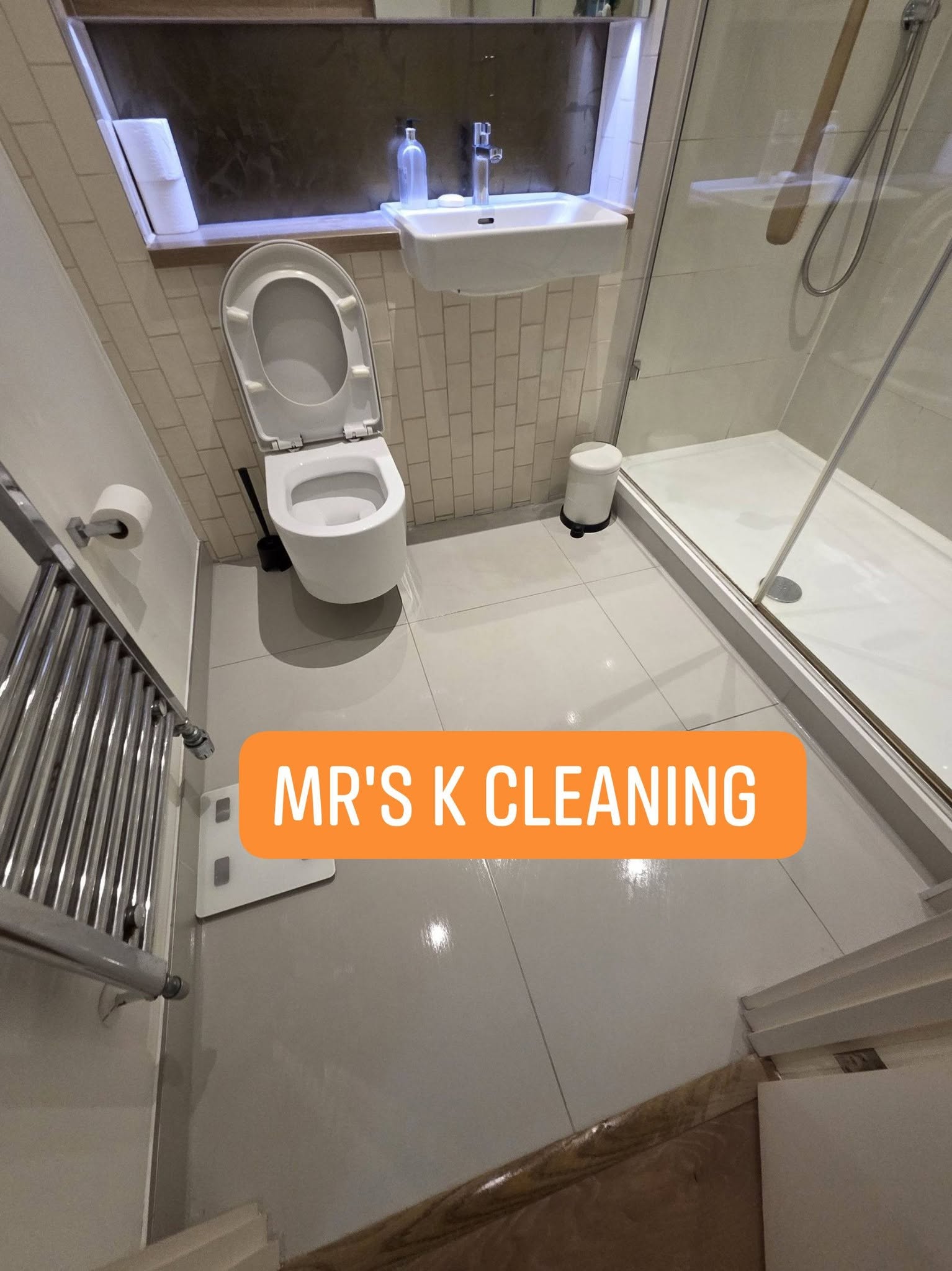 Clean modern bathroom with toilet and shower