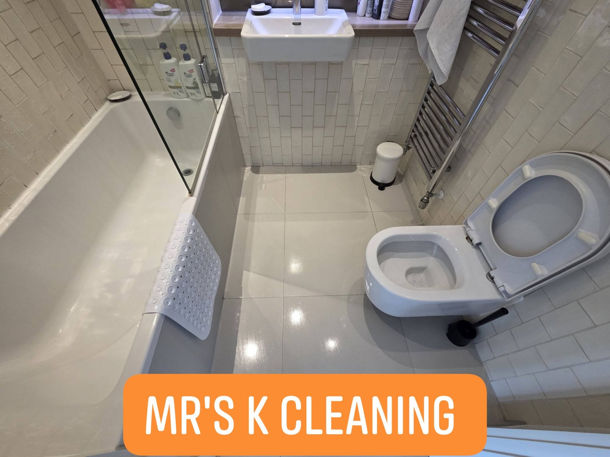 Clean modern bathroom with shower enclosure