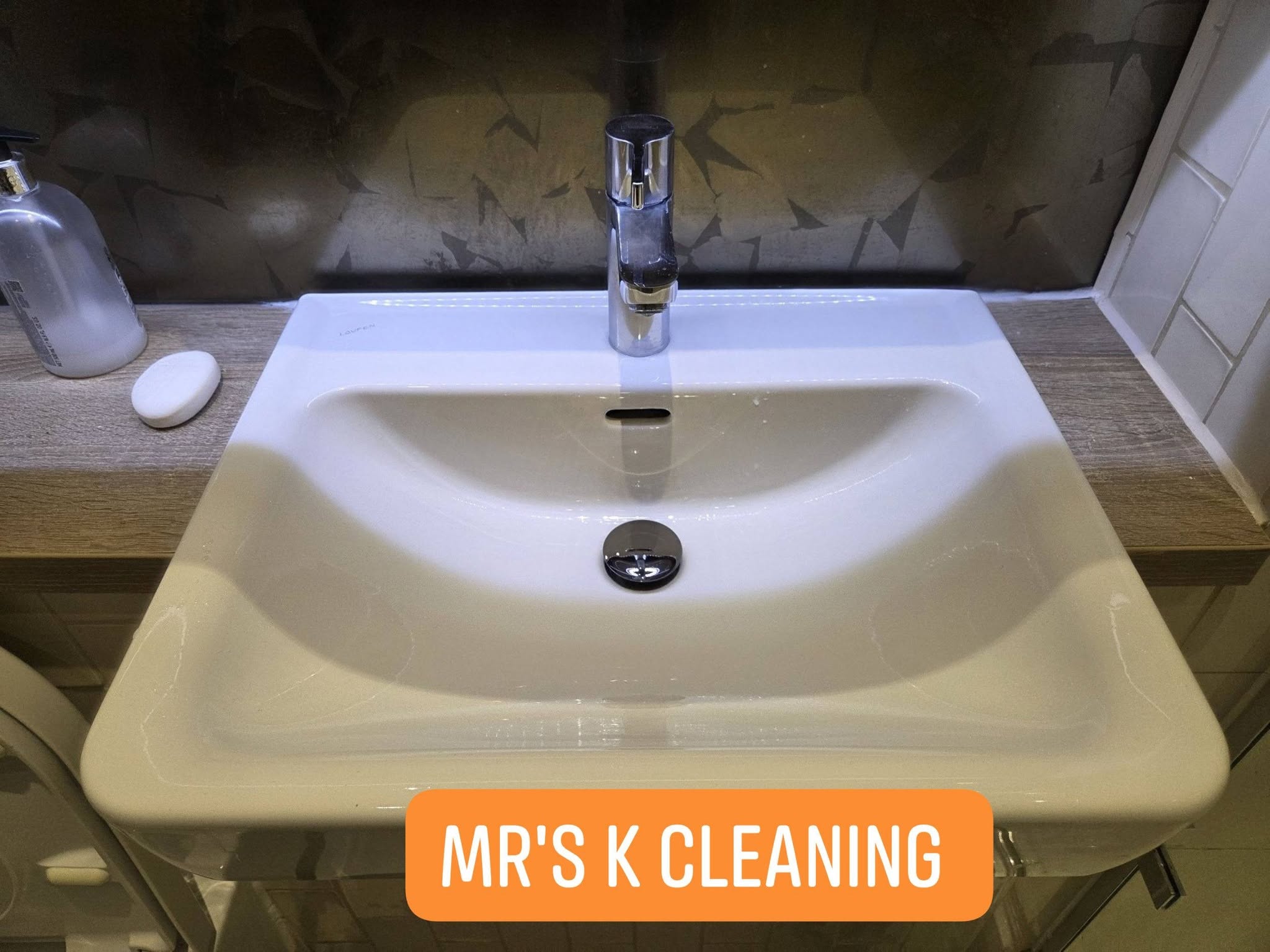 Sparkling bathroom sink with chrome faucet